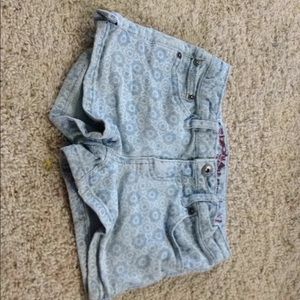 There blue patterned Arizona kids shorts.